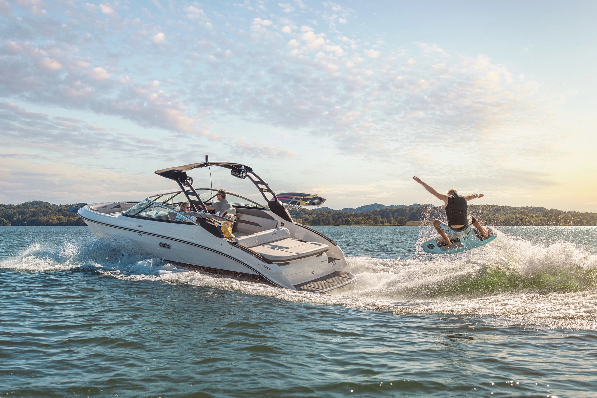 SLX-260-Surf-SXS260-lifestyle-running-port-stern-three-quarter-family-life-jacket-wakesurfing